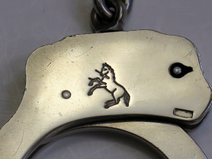 1974 colt handcuffs logo